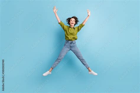 Photo Portrait Of Young Brunette Girl Jumping Up Spreading Legs Arms Like Star Isolated On