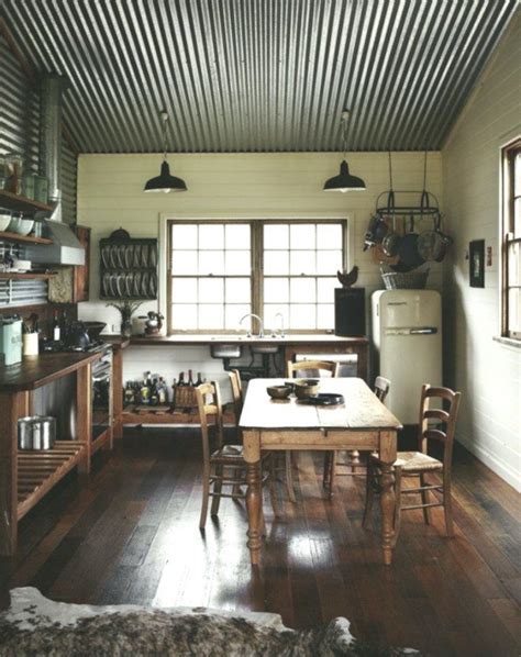 Kevin ritter of timeless kitchens pointed out valley tin works makes new tin ceiling tiles that he uses in his kitchen designs. Kitchen with Corrugated Metal Ceiling (With images ...