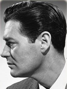 Modeled after elvis presley, samuel gets a pompadour hairstyle. sza: Men's Hair Trend