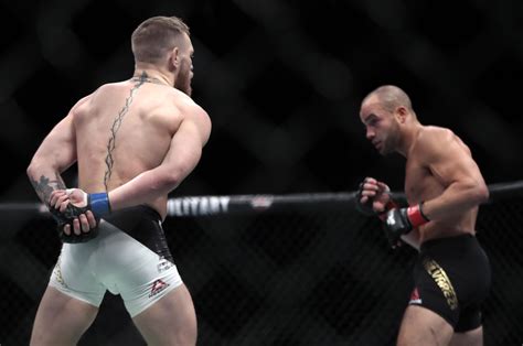 ufc 205 conor mcgregor becomes ufc s first 2 division champ seeks equity stake cbs news
