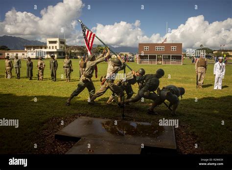 U.S. Marines reenact the raising of the flag on Mt. Suribachi from the