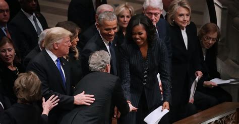 george w bush gives michelle obama candy at father s funeral popsugar news