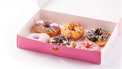 The Real Reason So Many Donuts Come In Pink Boxes