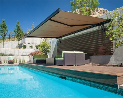 Retractable fabric awnings provide sophisticated shading options; Retractable Patio Awnings - SugarHouse Awning