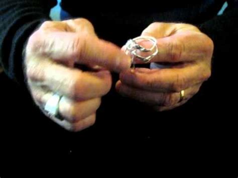 Try this four piece letter t riddle puzzle. ZeppoMerch.com Four Piece Puzzle Ring Instructions - YouTube