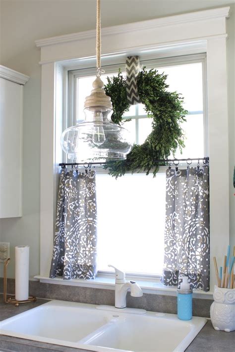 Modern kitchen curtain ideas above sink. Above the kitchen sink window curtain and wreath, pretty ...