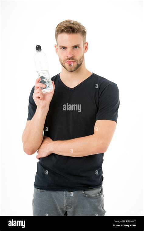Thirsty Man Hold Bottle Of Water Isolated On White Background Bearded Man With Beard In Tshirt