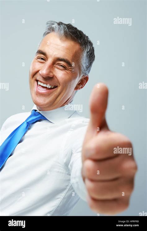 Happy Mature Business Man Showing Thumbs Up Sign Stock Photo Alamy