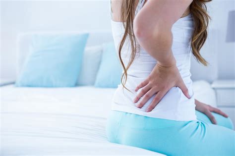 Attractive Woman With Back Pain Cascade Spine And Injury Center