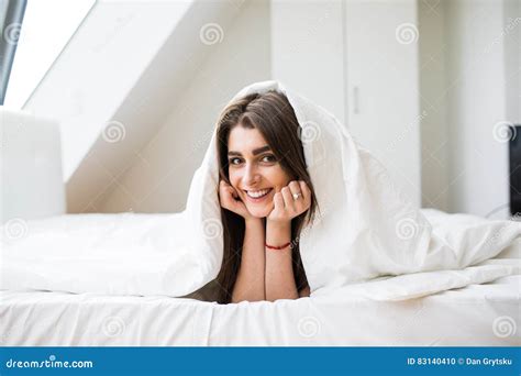 Woman Under A Duvet In Her Bedroom Stock Photo Image Of Person Lady