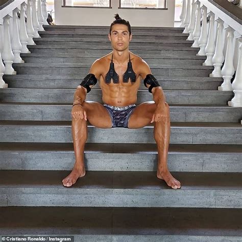 Shirtless Cristiano Ronaldo Shows Off His Rippling Abs And Lockdown Man Bun Wearing His Own