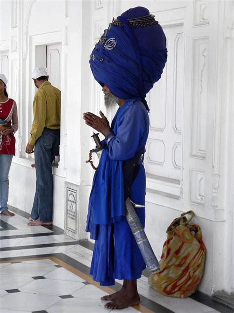 Sikh Praying Sikhs Are Recognized By Their Distinctively