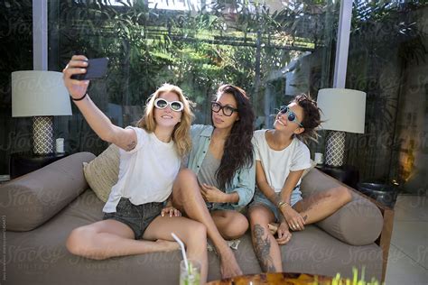 Three Girlfriends Take Selfie Together With Sunglasses On At Home By Stocksy Contributor Jovo