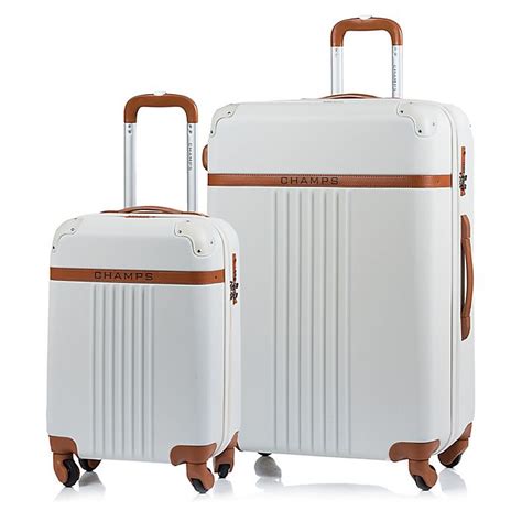 Champs Vintage 2 Piece Hardside Expandable Spinner Luggage Set Bed