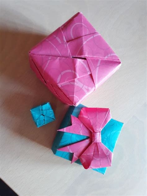 Eine faltanleitung zum nachmachen einer schachtel box. Schachteln, Box, Schleife, Origami | Basteln, Schachteln, Origami