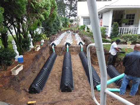 A septic tank is a large tank meant to store sewage waste while it settles. Drain Field Installation Gallery | Averett Septic Tank Co ...