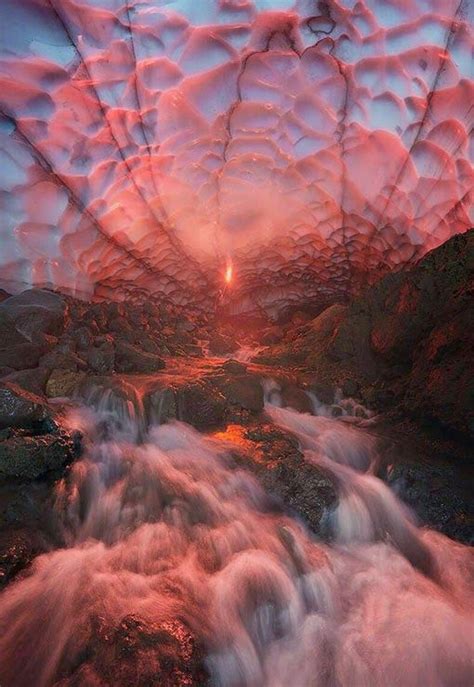Sunset Through An Ice Cave Under A Glacier In Russia Beautiful