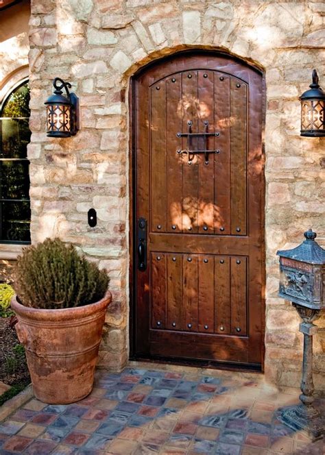 I just got the best price for exterior doors from this company. Mediterranean Front Door with slate tile floors by Morey ...
