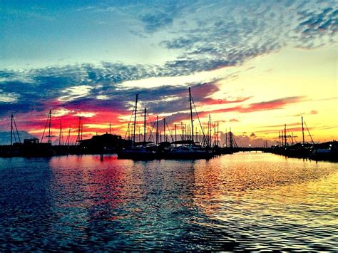 Sailboats In The Harbor At Sunset By Gigglefactory18 Redbubble