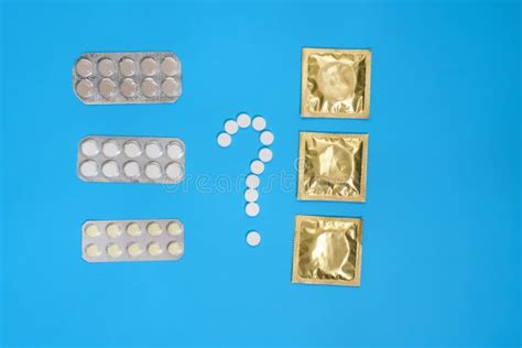 pills or condom antibiotics from venereal diseases concept of safe sex medical concept lay