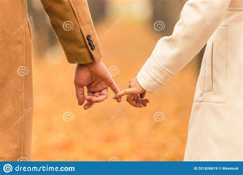 shot of hands of loving couple holding each other stock image image of couple guitarist