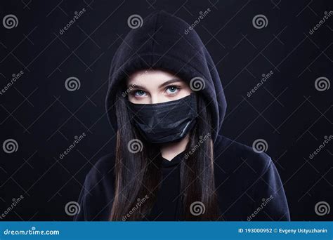 Young Woman In Black Mask And Hood Girl In Black Mask And Hoodie Stock