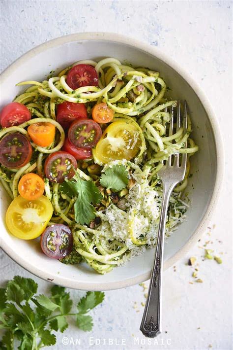 Low Carb Spiralized Yellow Squash Noodles With Tomatoes Pesto And Parmesan