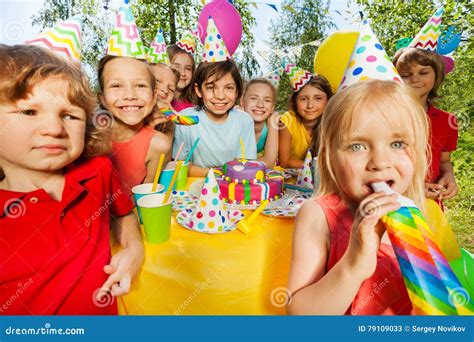 Happy Kids Having Fun With Party Whistles Stock Image Image Of