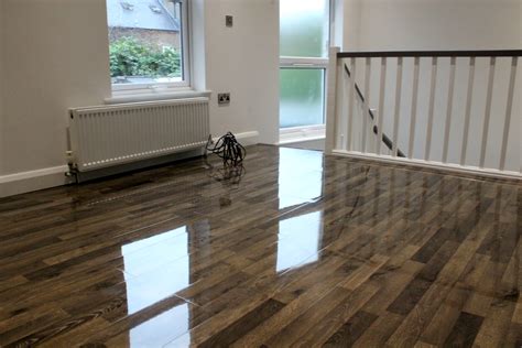 Floorless Floors Supplies Ivory High Gloss Laminate To Local Property