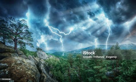 Lightning Thunderstorm Flash And Sun Lights In The Mountains Concept On