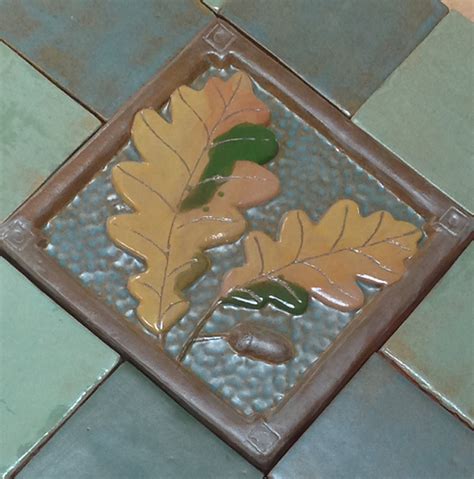 The oak leaf tile offered here is two inches by two inches. 6 inch Oak Leaf & Acorn tile for fireplace and kitchen ...