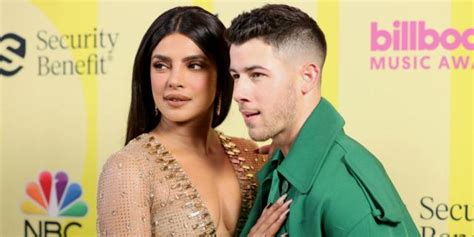 Priyanka Chopra Stuns In A Sheer Nude Plunge Dress With Nick Jonas At