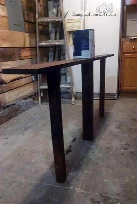My kids tablets and chargers were taking over our lives! Console table charging station for behind our sofa: DIY ...