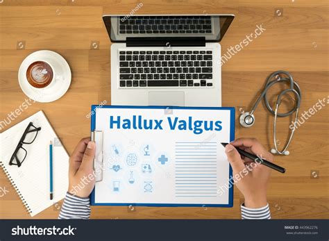 Hallux Valgus Doctor Writing Medical Records Stock Photo Edit Now