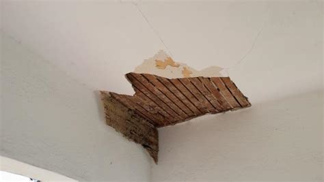 Tape the top of the walls, around the edge of the ceiling. Release of stucco on porch ceiling! - DoItYourself.com ...