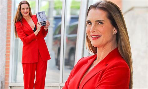 Brooke Shields Looks Radiant In A Bright Red Pantsuit While Posing For