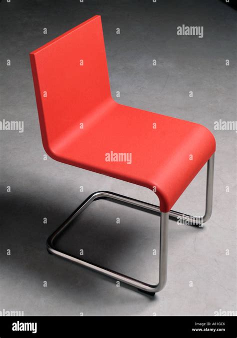 Modern Red Plastic Kitchen Chair On A Concrete Floor Design By Dutch
