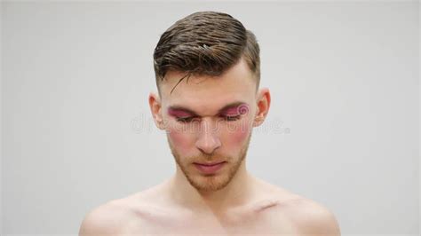 Modest Travesty Guy Looking At Camera Close Up Front View Of Transsexual With Bright Makeup