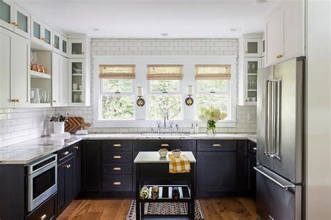 Black Lower Cabinets With Brass Cup Pulls Transitional Kitchen