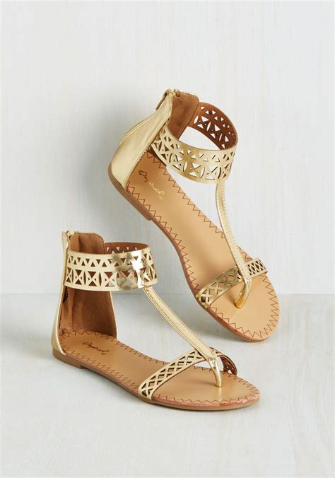 Notoriously Noticeable Sandal These Metallic Gold Sandals Have A