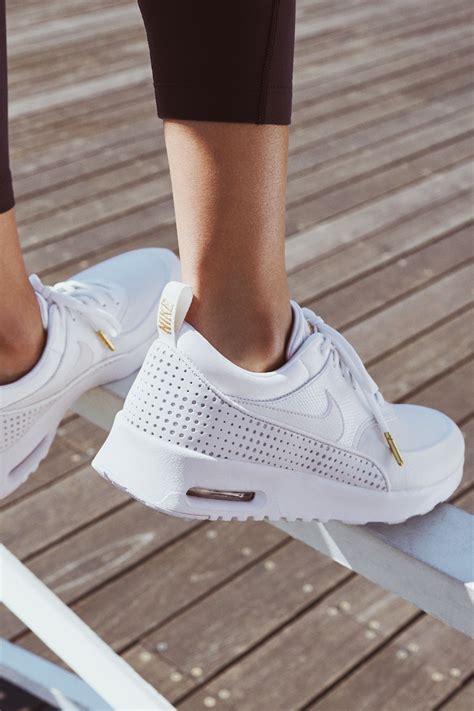 This style is featured here in an all white colourway with an engineered mesh upper for ultimate breathability and simplistic hyperfuse panels. Women's Nike Air Max Thea Premium 'Summit White & Metallic ...