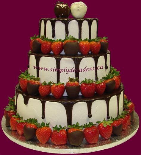 Wedding Cake With Chocolate Dipped Strawberries And Ganache