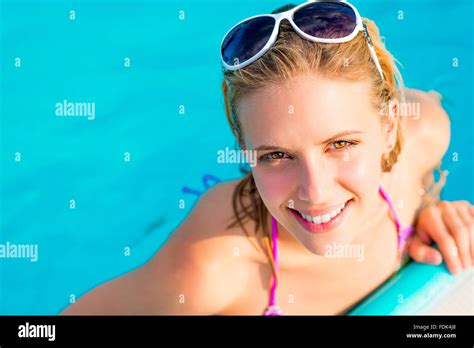 Beautiful Young Woman In The Swimming Pool Stock Photo Alamy