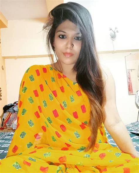 beautiful desi girl in yellow saree scrolller