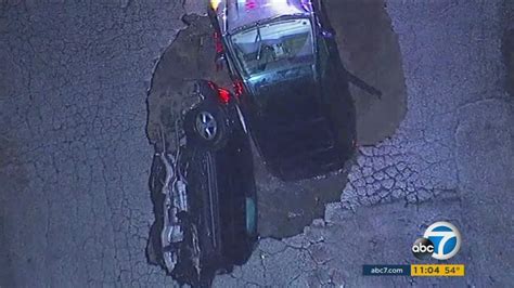 1 Person Injured After 2 Cars Fall Into Massive Sinkhole In Studio City