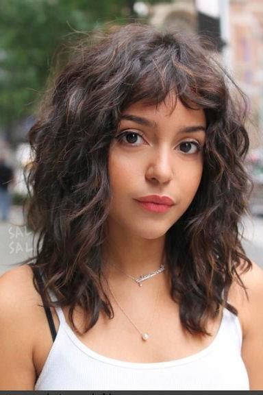 Proof That Curly Hair Girls Can Wear Bangs Too Southern