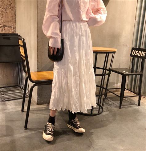 2019 Mujeres Faldas Nueva Moda Coreana Arrugada Midi Falda Femenina De Cintura Alta Suelta