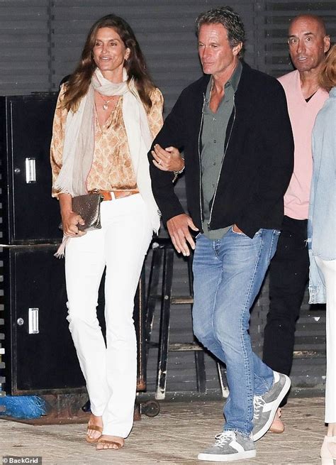 Cindy Crawford 55 And Husband Rande Gerber 59 Lock Arms Daily Mail Online