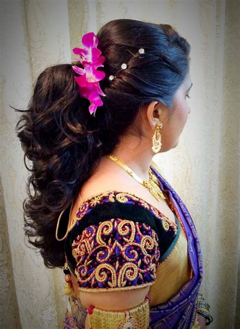 The wedding events are celebrated with a lot of pomp and grandeur, and fun all over the country. Indian bride's bridal reception hairstyle by Swank Studio ...