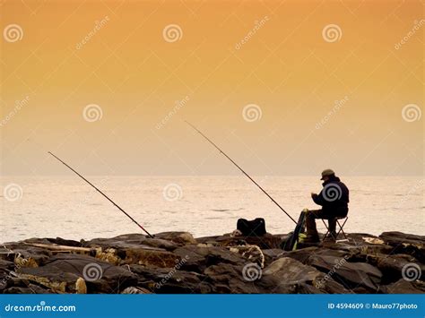 Fisherman At Sunset Stock Image Image Of Relaxation Fishing 4594609